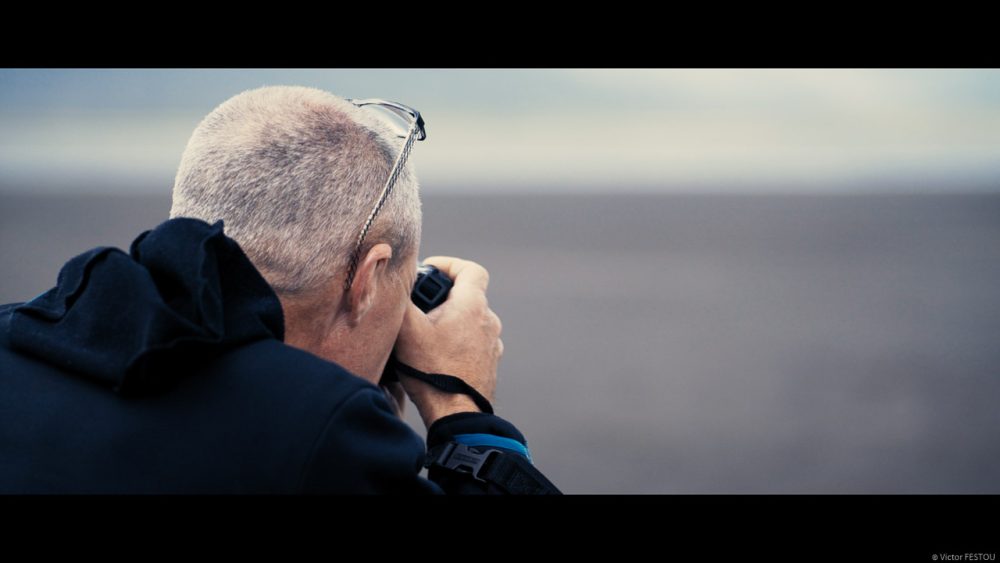 Photographer taking pictures graded